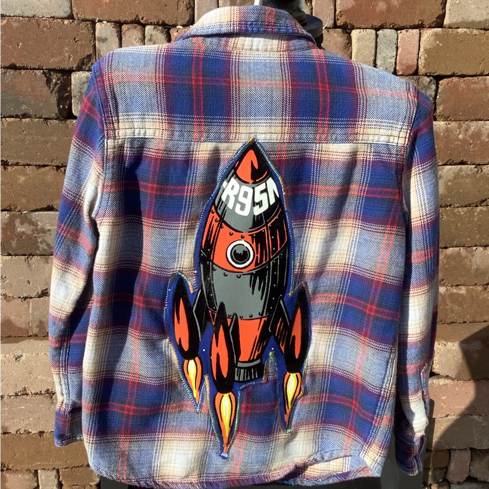 EUC recycled Lucky Brand Boys size 5 flannel with rocket ship appliqué.